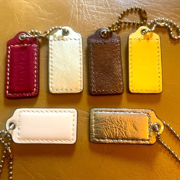 Coach leather purse jewelry/charms (6 included). 2” x  1” - Picture 2 of 3